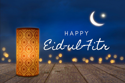 Happy eid ul fitr text with image of lantern.